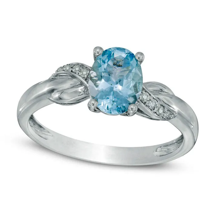 Goldia Rings Oval Aquamarine and Natural Diamond Accent Twist Ring in Solid 10K White Gold