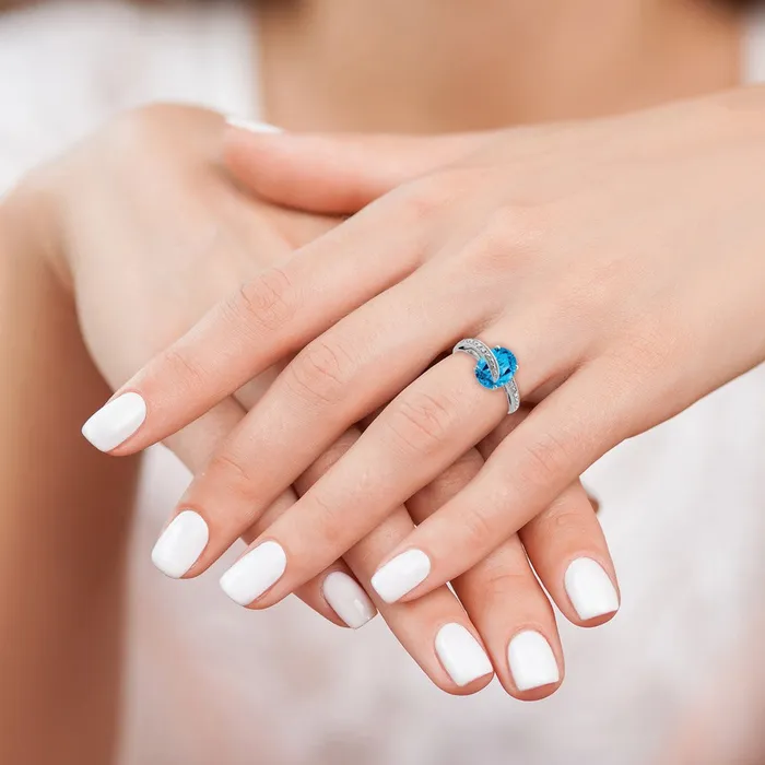 Goldia Sterling Silver Rhodiumplated Polished Swiss Blue Topaz Dia Accent Ring Rings