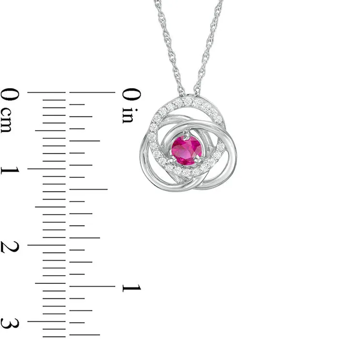 Necklaces 40mm LabCreated Ruby and 01 CT TW Diamond Love Knot Frame Pendant in Sterling Silver Goldia